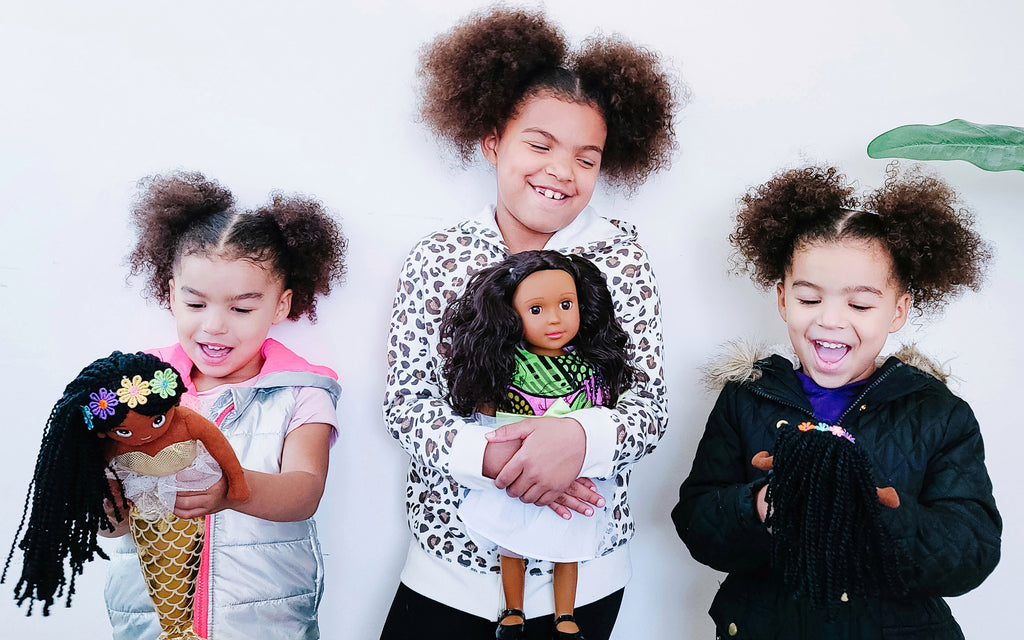 Black girls playing with Ikuzi Dolls. African American Dolls