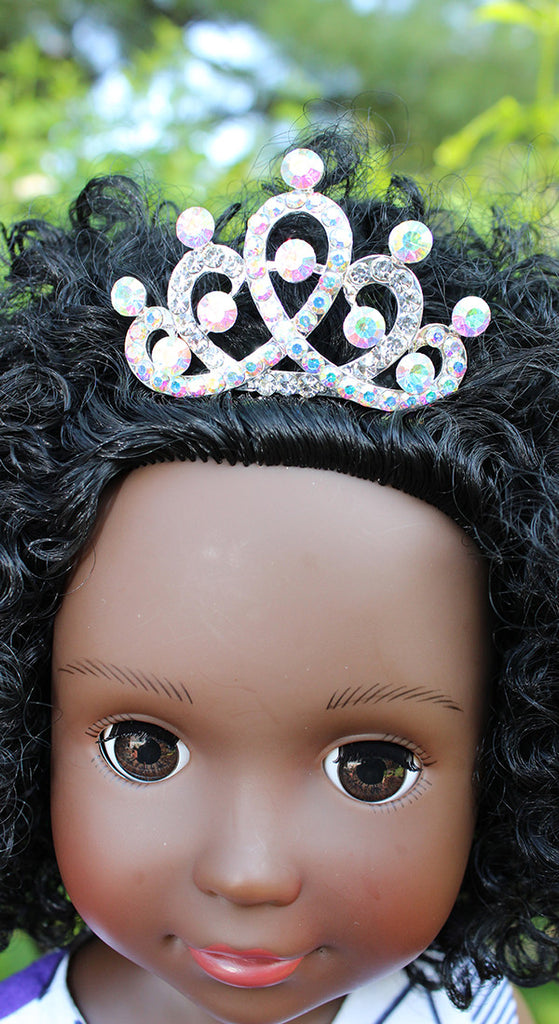 black doll with a crown